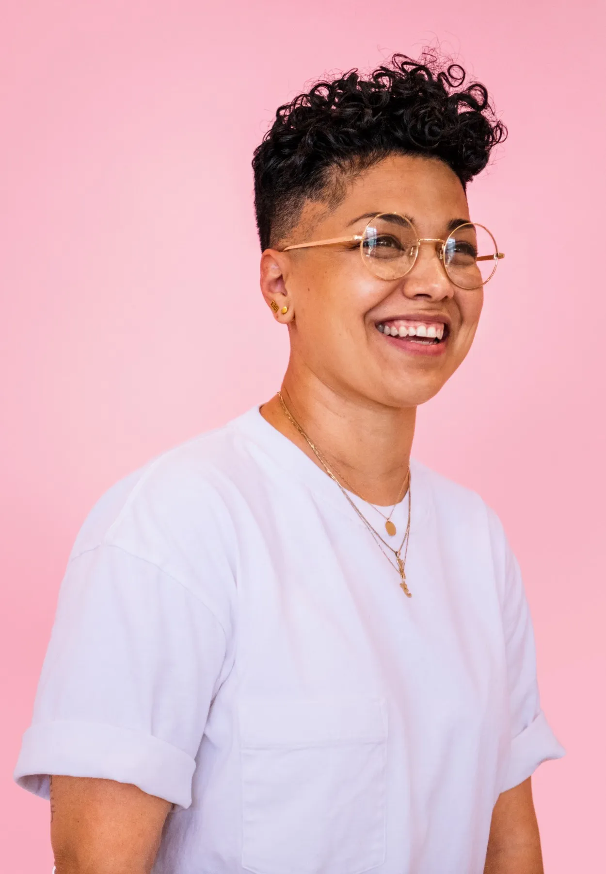 Large image of Girl with short hair and blue shirt